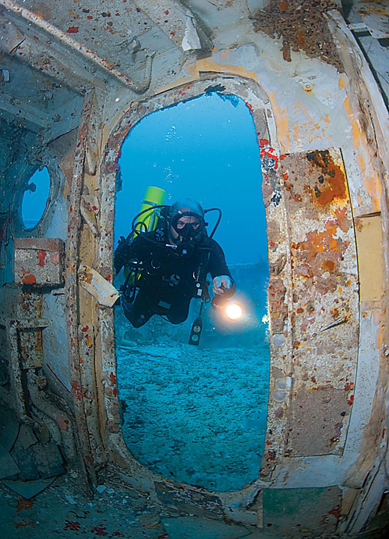Never enter any opening into a wreck unless you have the proper training and gear.