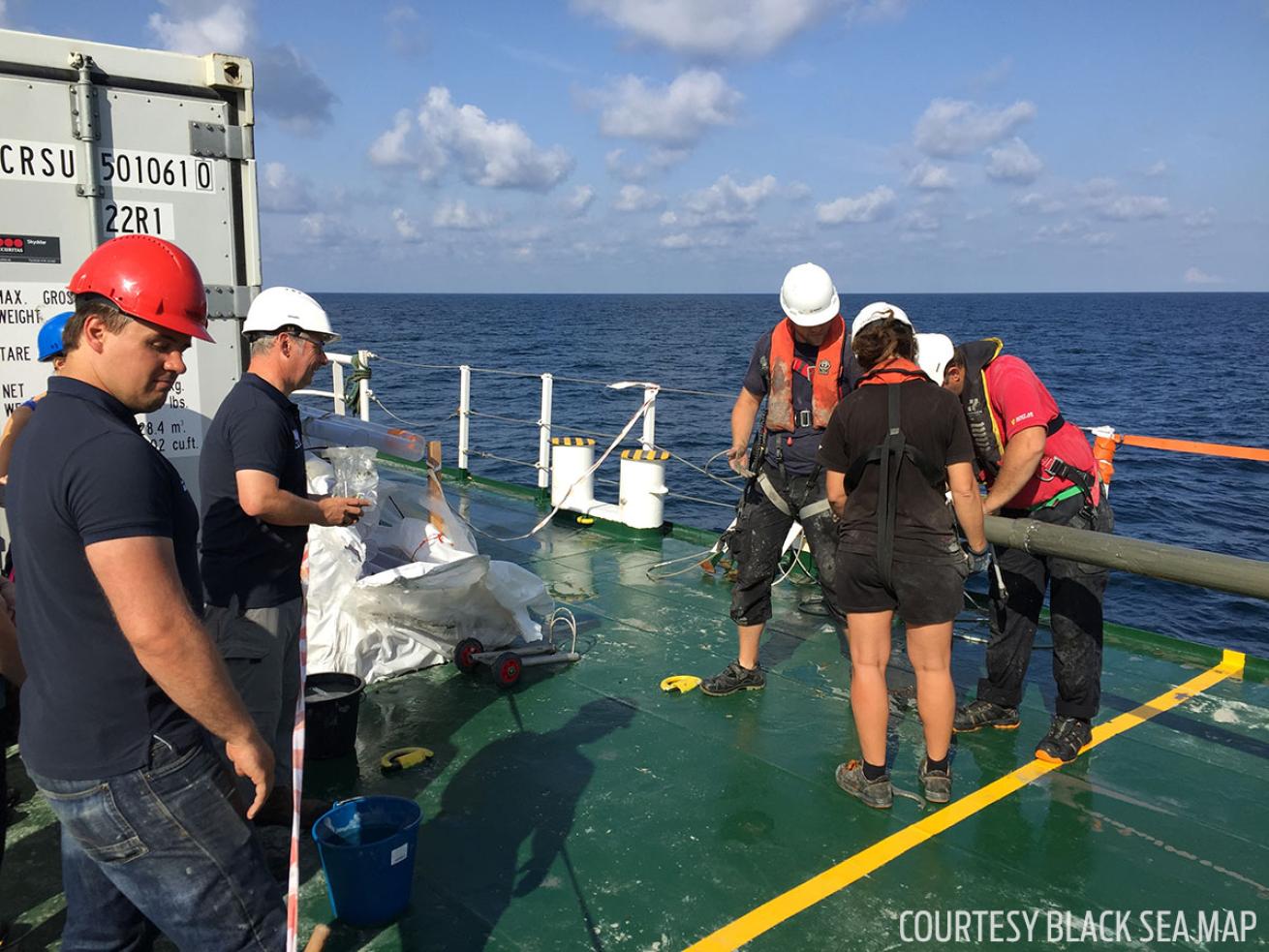 Underwater researchers waiting on the surface of the Black Sea