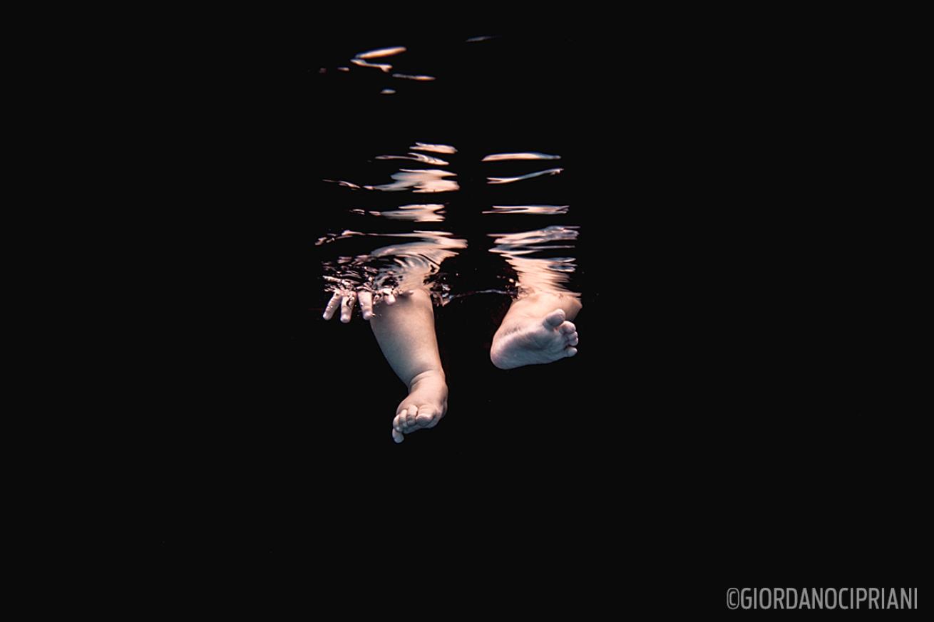 A baby scuba diver takes their first steps into the underwater world