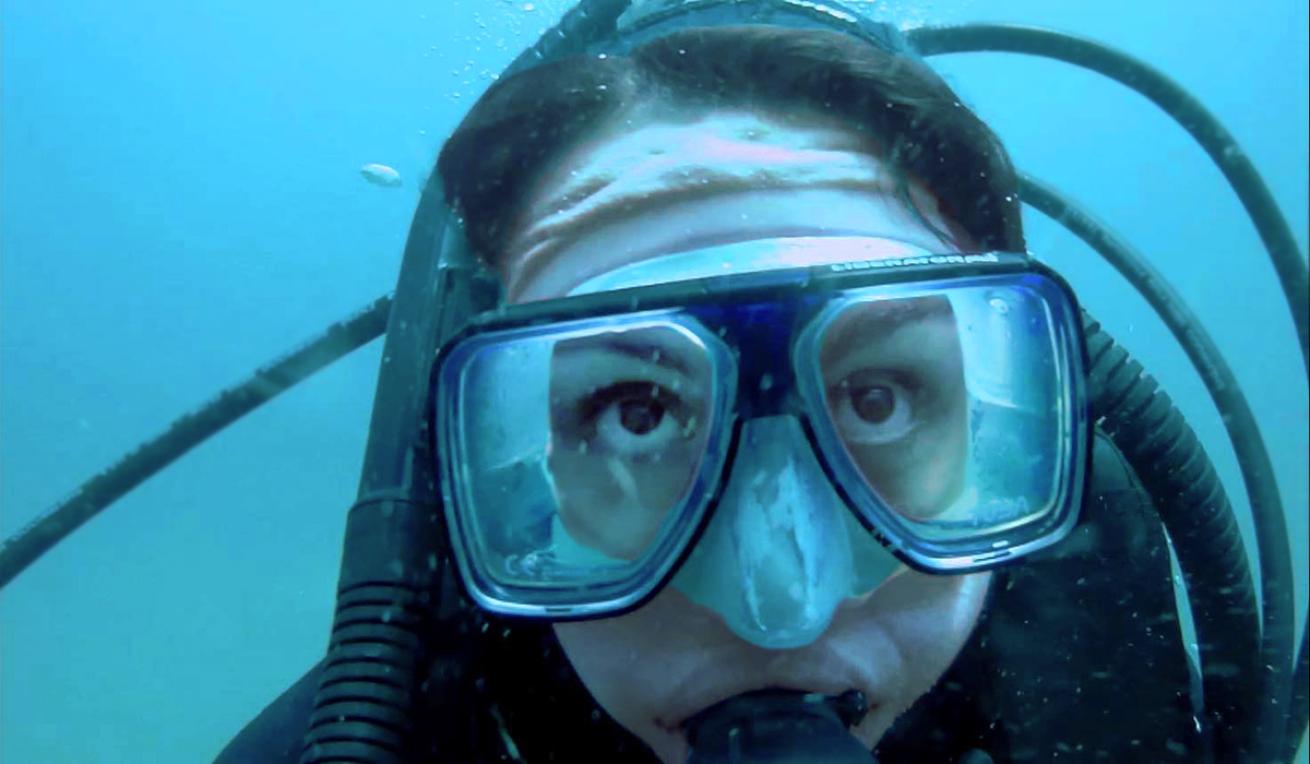 Diver swims close to camera in White Star Quarry