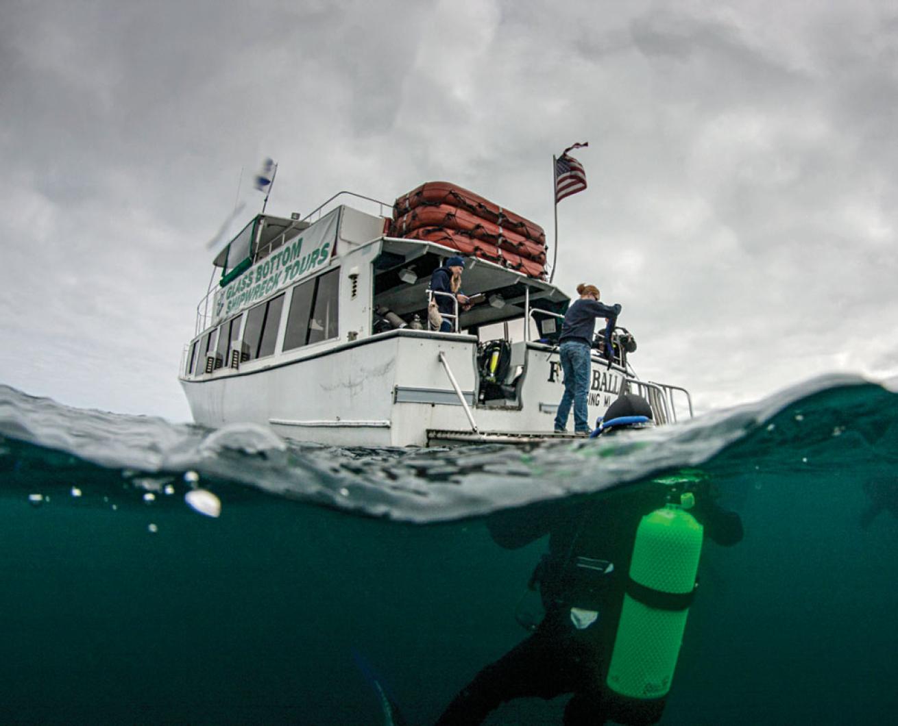 A diver drops into the Alger Underwater Preserve.