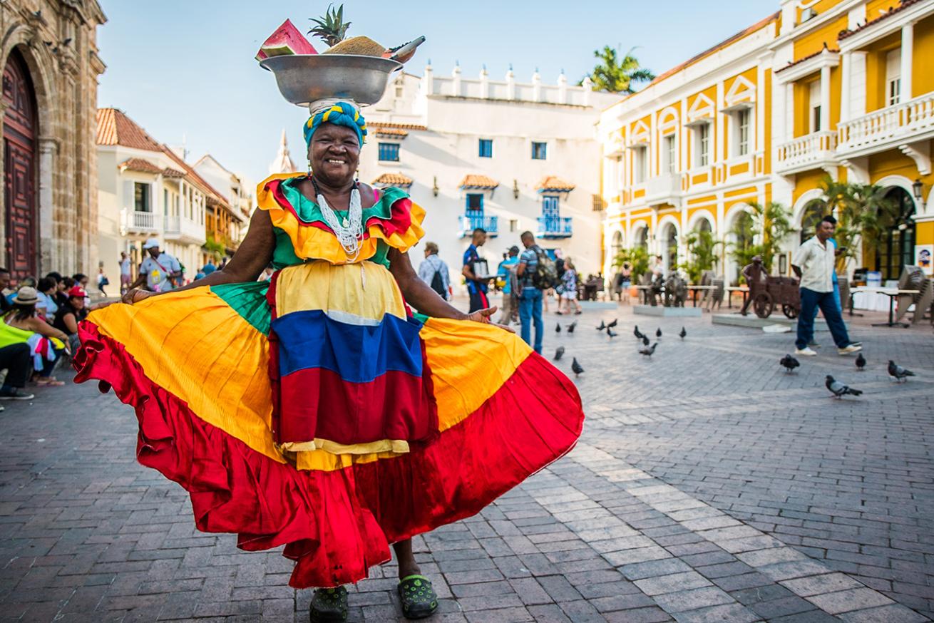 image of woman in colombia in traditional dresses