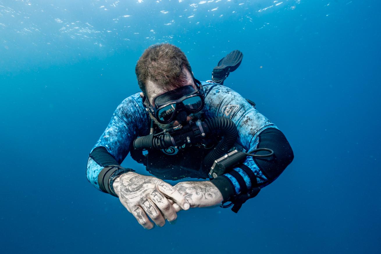 Jay finishing up a dive on his O2ptima CM eCCR. If you look close at his mask you can see the reflection of the HUD for helping monitor PPO2.