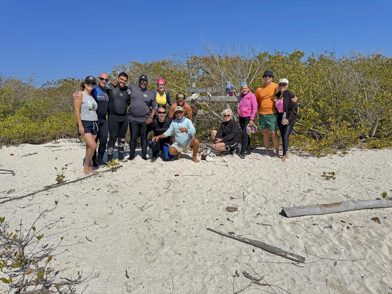 The cast and crew of Boat Two spend surface intervals on a deserted beach occupied by hutias (above), iguanas and hermit crabs.