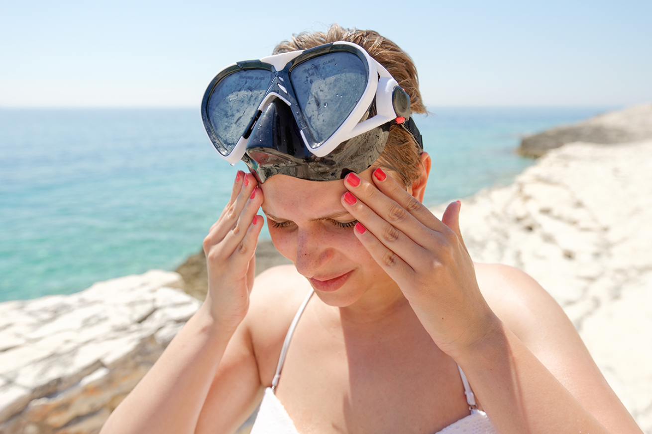 Beachgoer with headache