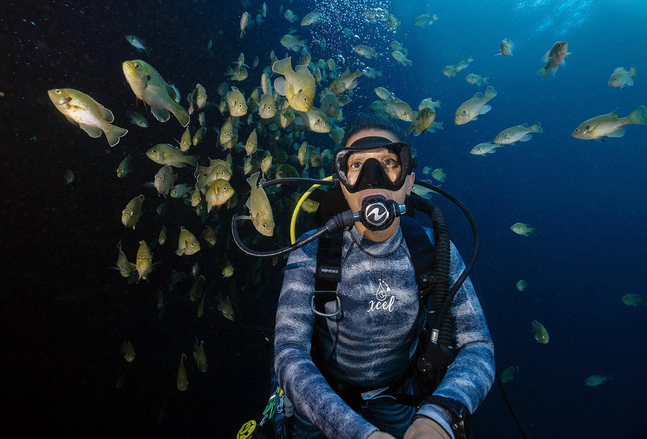 A diver tests regulators at Blue Grotto Dive Resort in Florida.