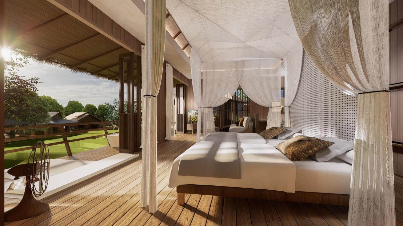 A bed with white curtains