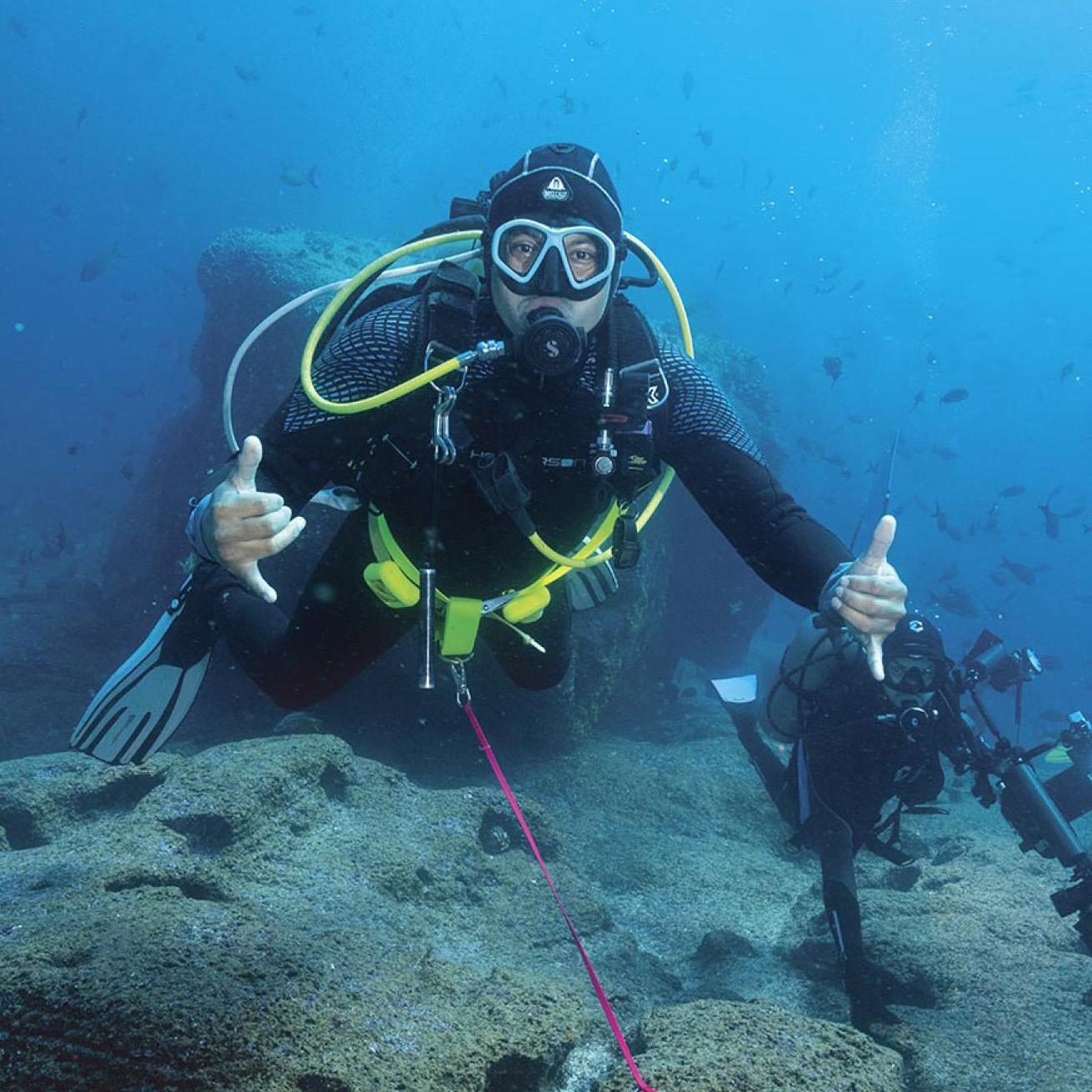 A reef hook makes Galapagos diving much more relaxing, especially for photographers.