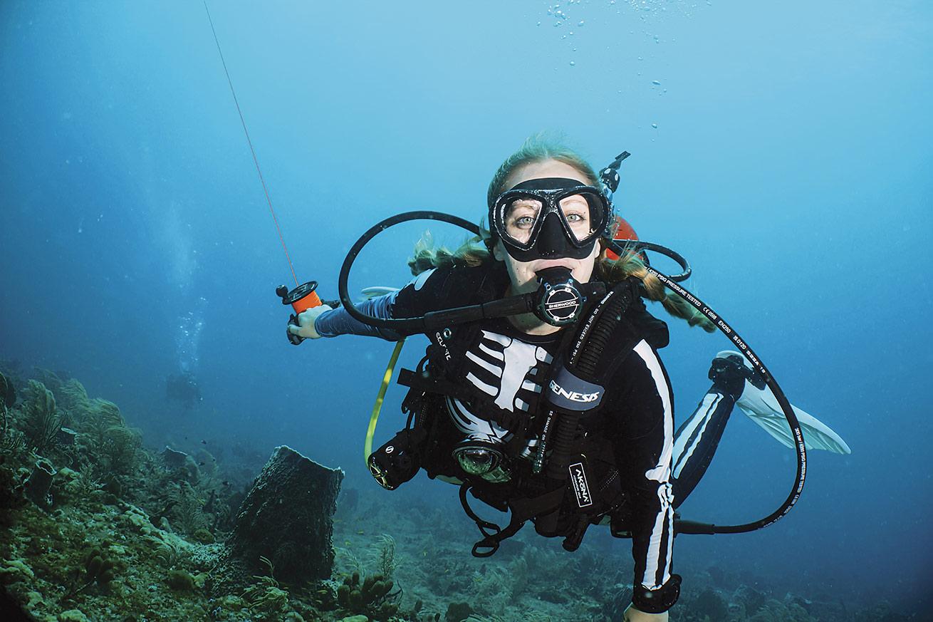 Olivia sports a rash guard from her merchandise line, which is one of her streams of income.