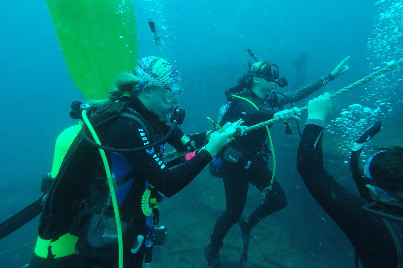 A group of people in scuba gear