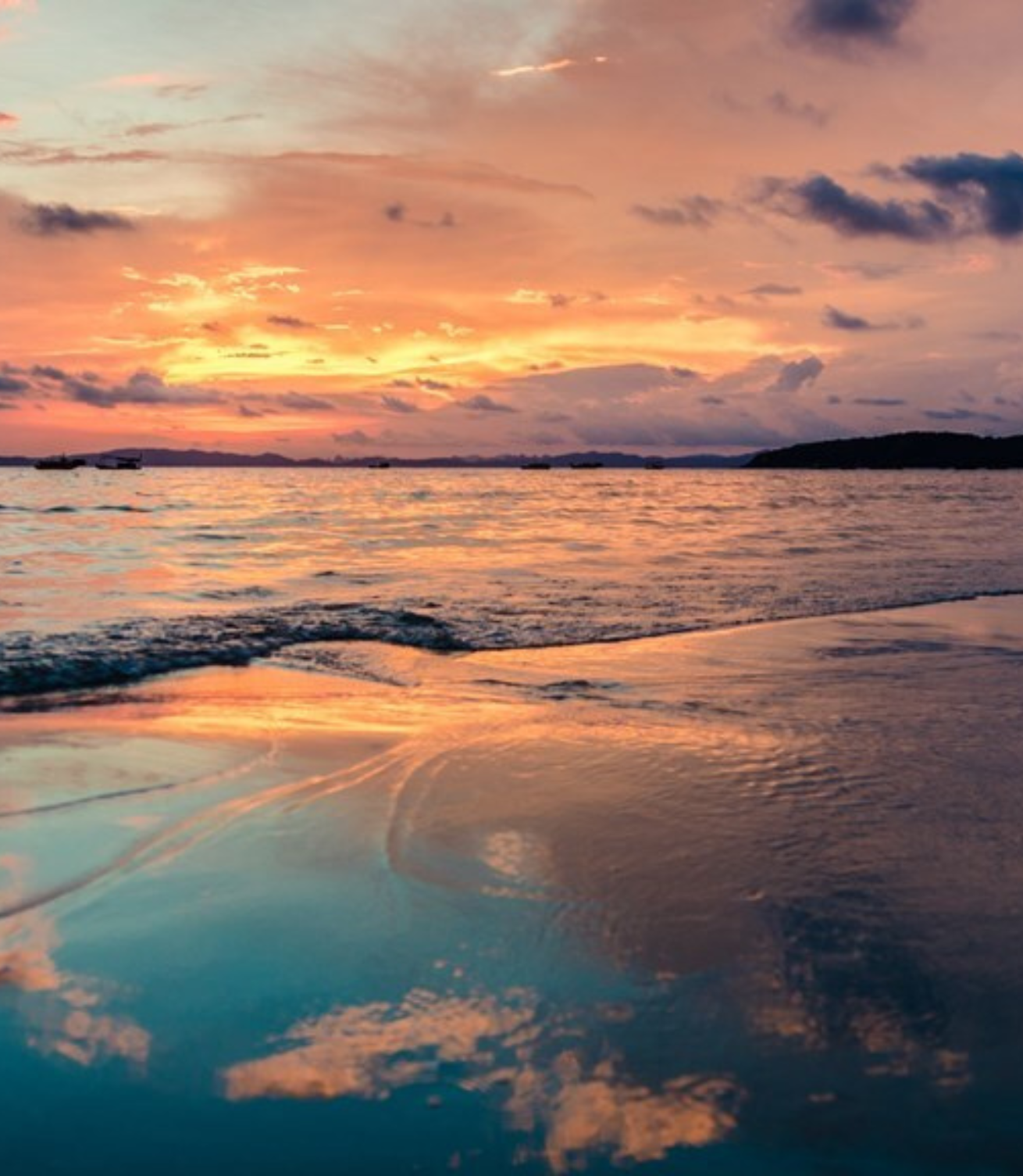 A sunset over a body of water
