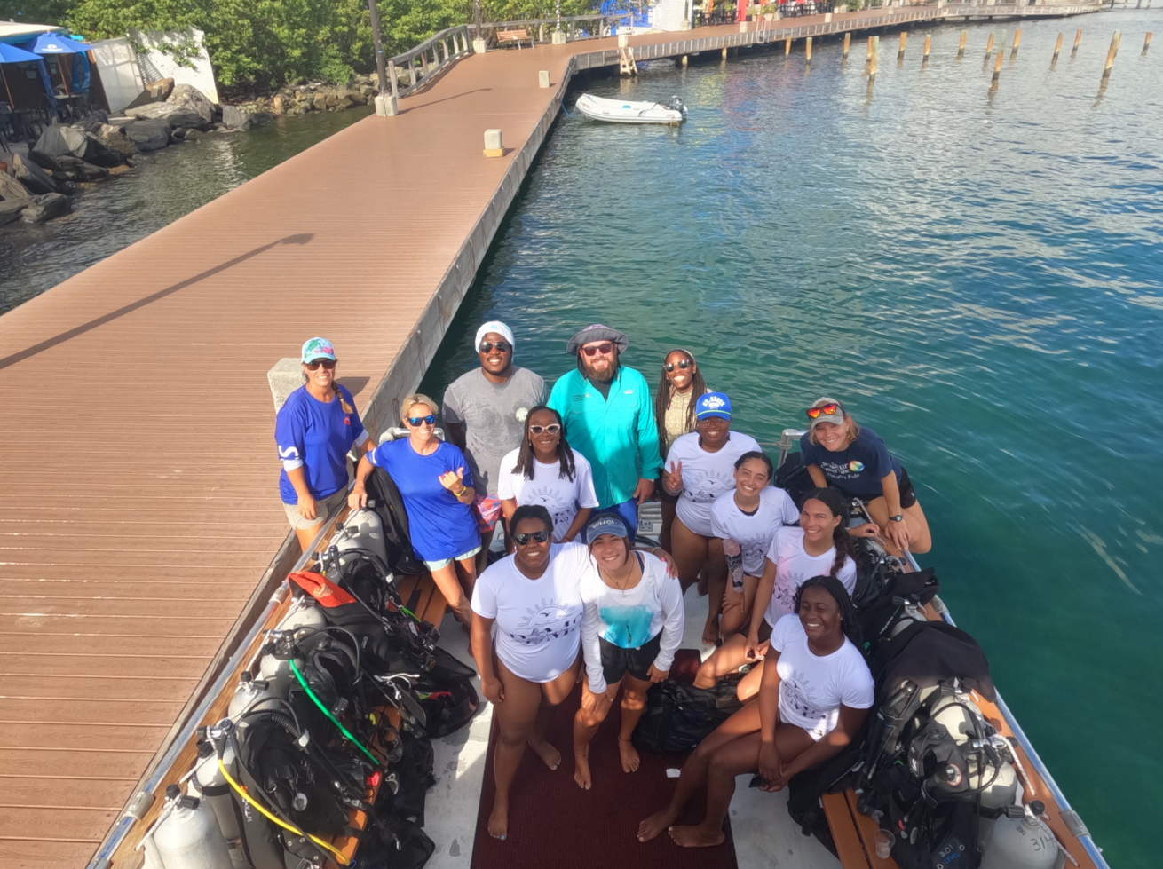 The students and Staff of St.Croix BIP week 2023 (left to right: Liz Czok , Jo Barendse (TNC), Hillard Hicks (DPNR), Scott Marusa (TNC), Kelcie Troutman, Camille Gaynus, Andria Miller, Yaira Ortiz, Lisa Terry, Leslie Townsell, Delsa Gonzalez (TNC), Michelle Laudat, Jasmine Winston