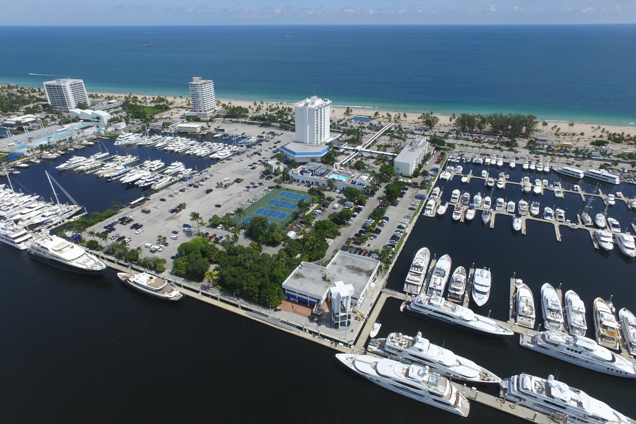 An aerial view of a marina with many boats