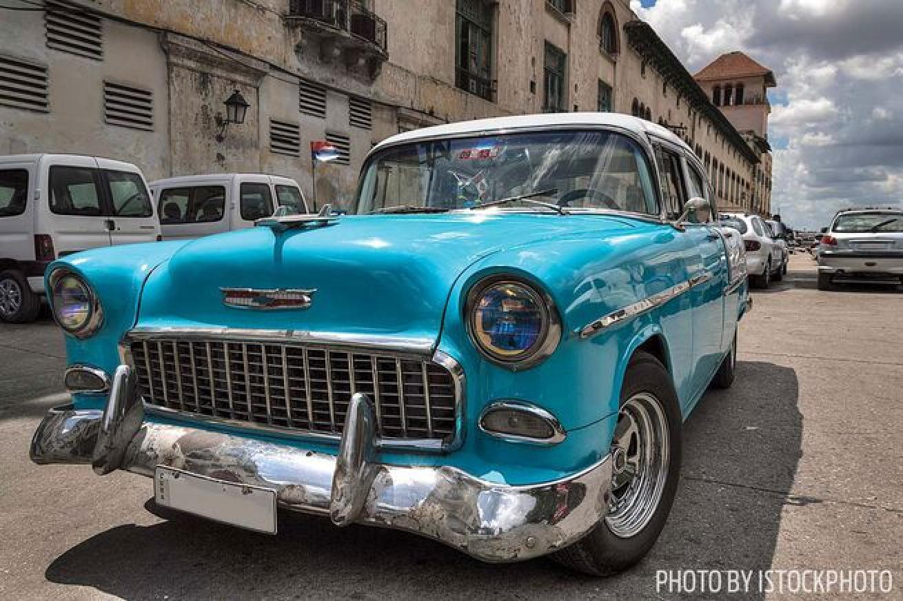 A vintage car near Havana Bay