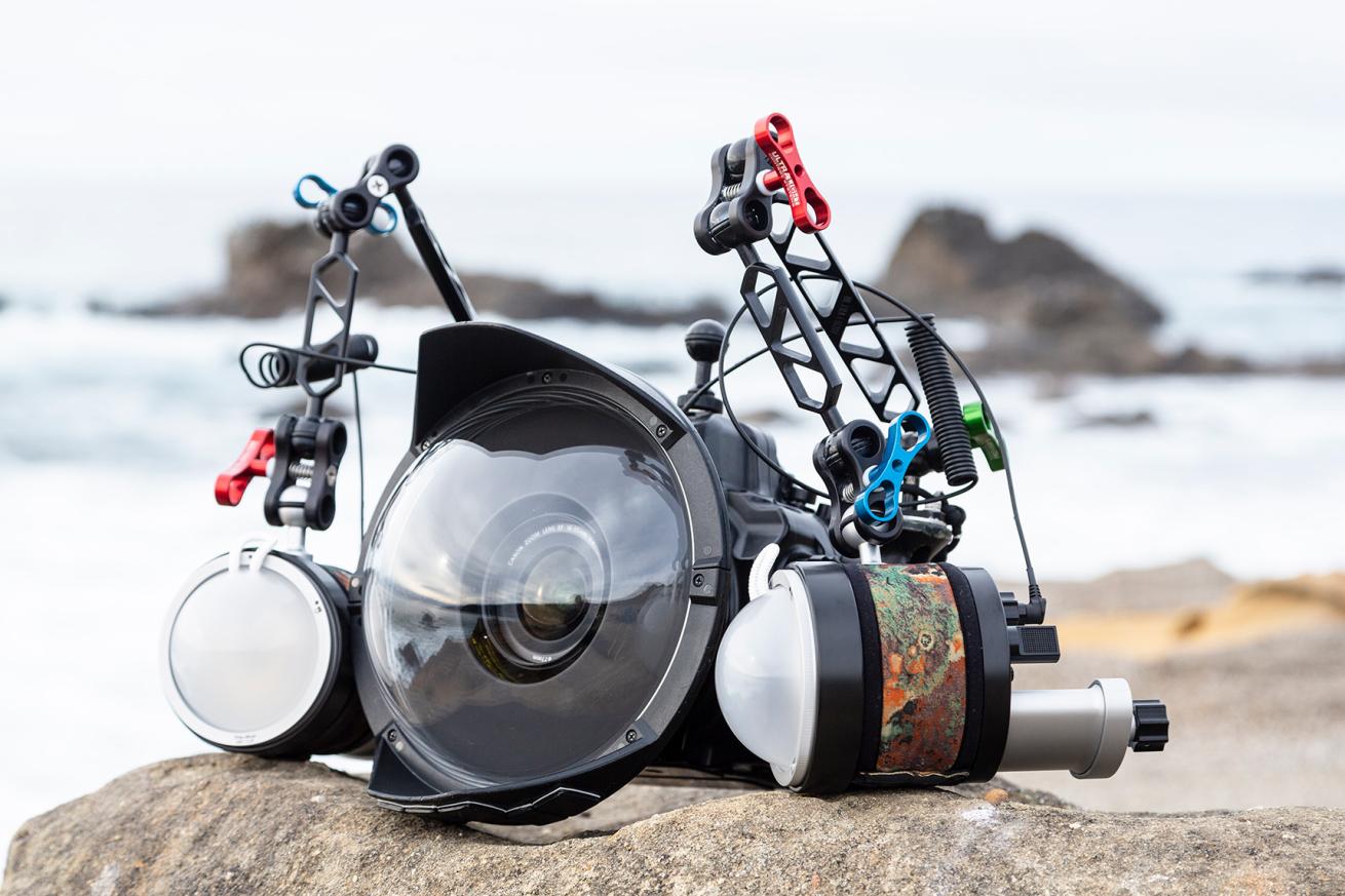 image of an underwater camera with strobes on a rocky beach