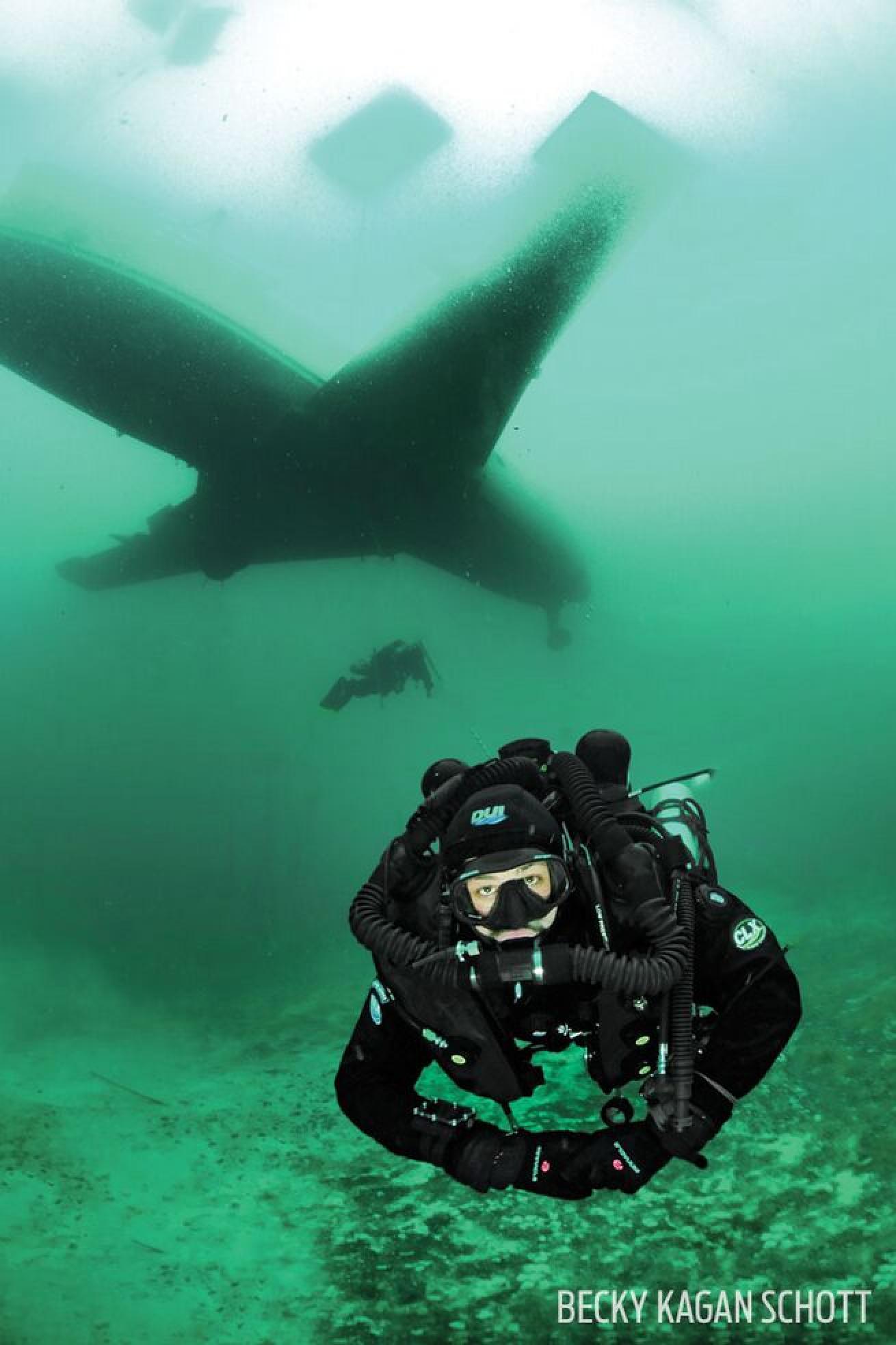 A rebreather diver floats after exiting the Bombardier Challenger 600 jet.