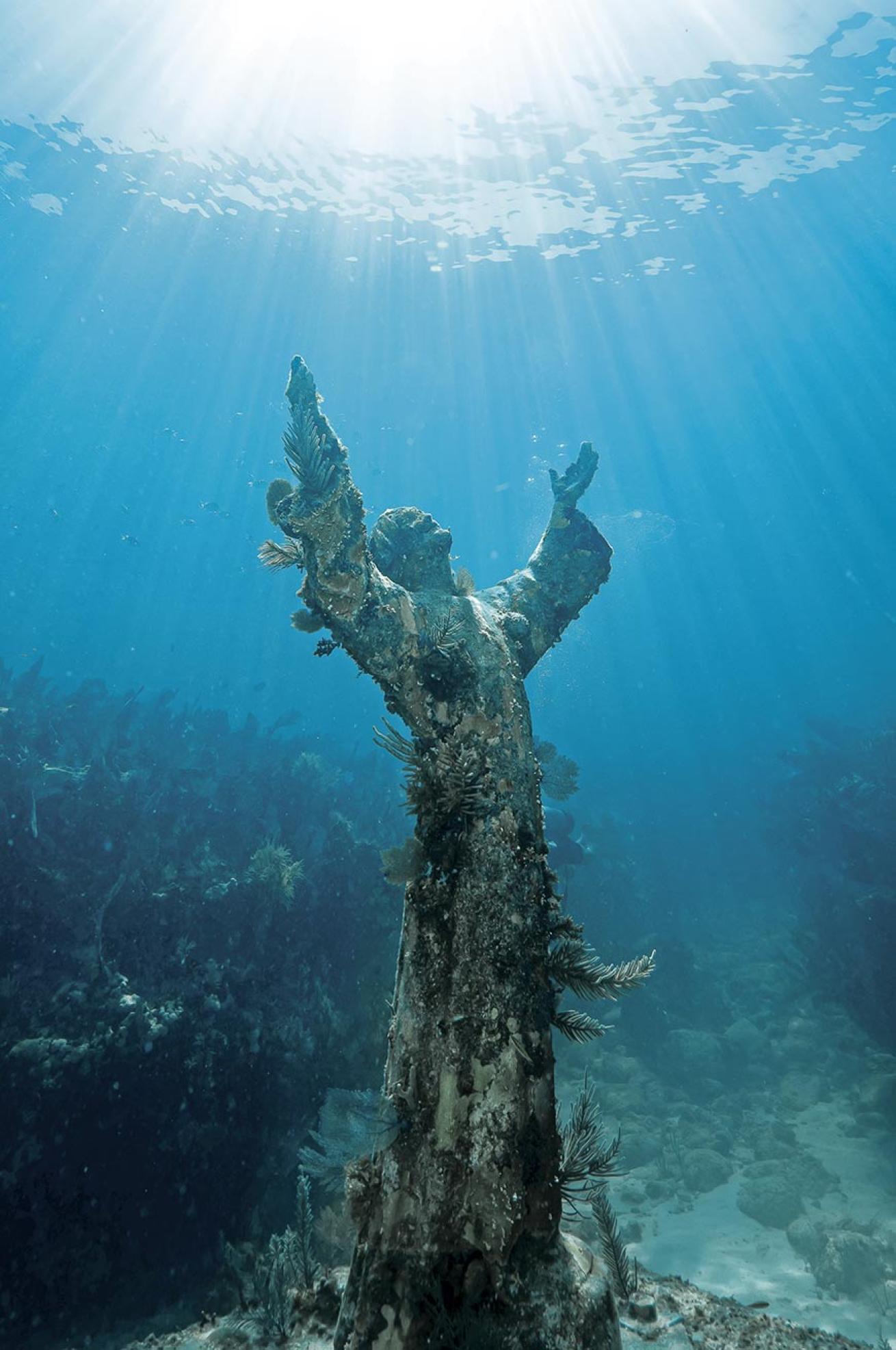 Christ of the Abyss, a bronze statue placed in the sea just off the coast of Key Largo, is a prime spot for a photo op.