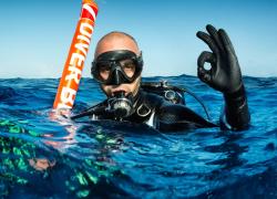 Diver At Surface Emergency Ascent